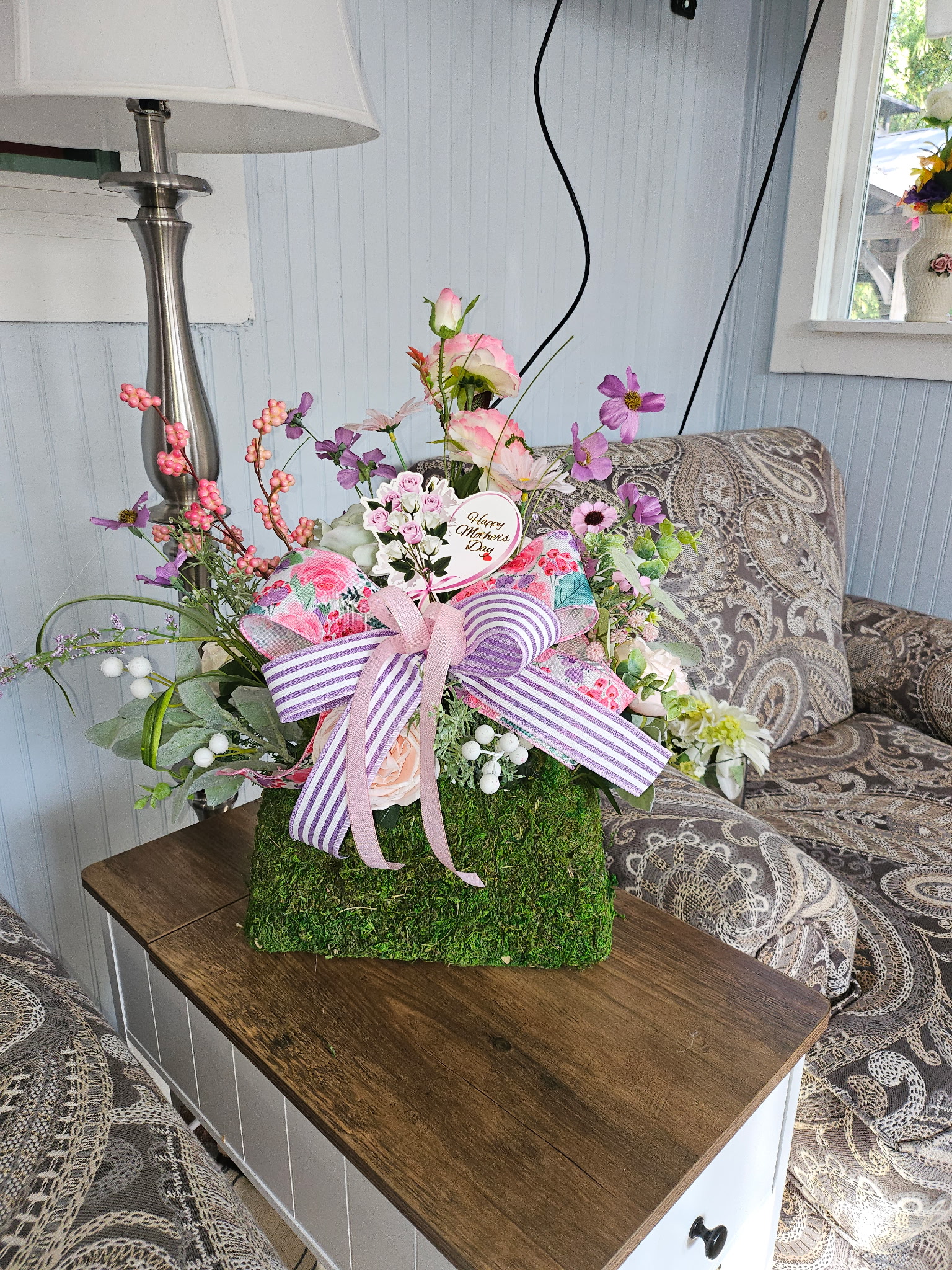 Mother's Day Floral Arrangement in Moss Purse